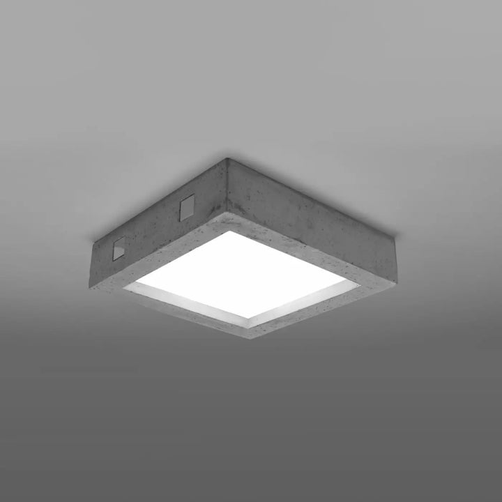 Luminaire plafonnier riza en béton moderne avec panneau lumineux blanc pour aménagements industriels et atmosphère harmonieuse