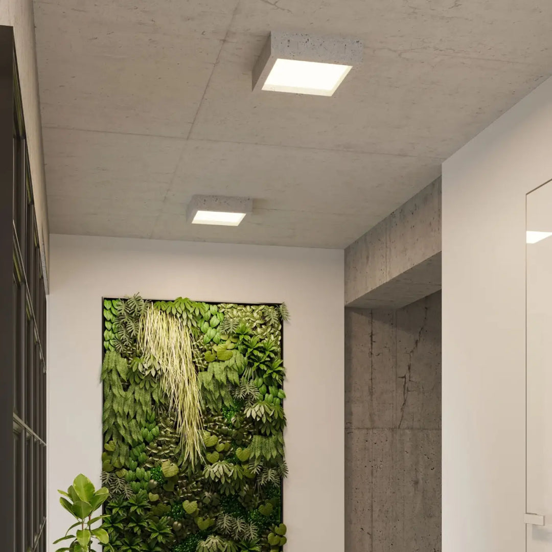 Luminaire plafonnier rincé carré en béton moderne avec finition blanche mate et panneau led intégré pour aménagements industriels et atmosphère harmonieuse