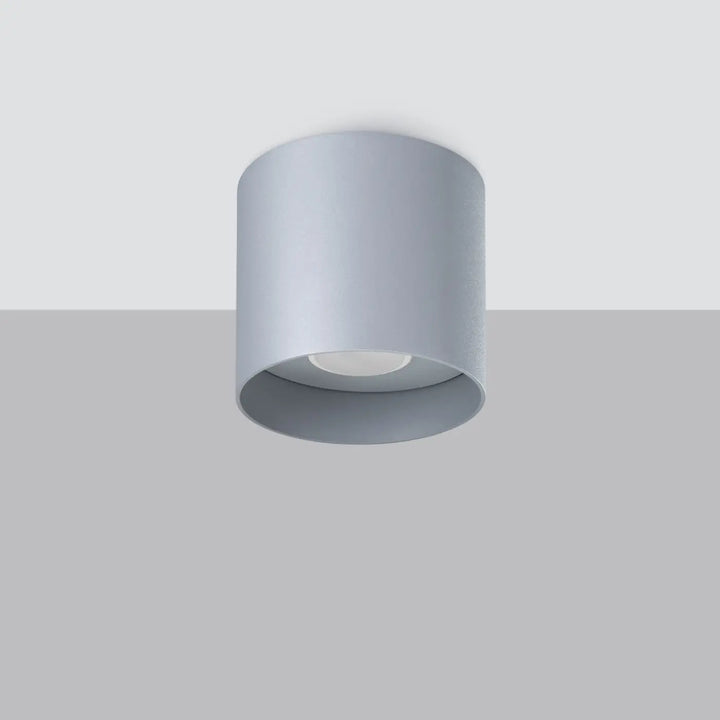 Luminaire plafonnier mika gris moderne allie simplicité avec design cylindrique mat encastré au plafond