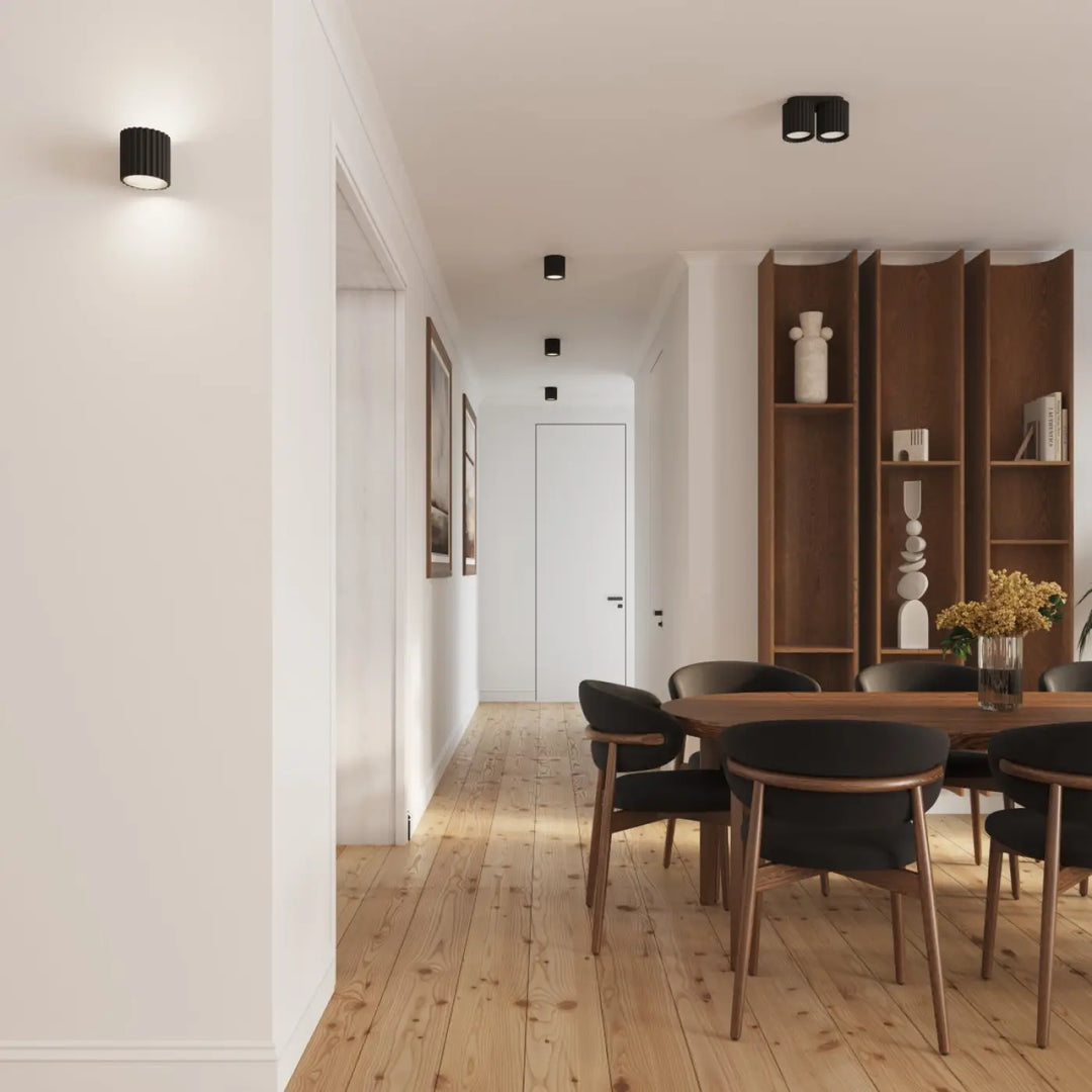 Luminaire plafonnier aura 1 noir en forme unique inspirée avec fini mat et texture cannelée noire cylindrique