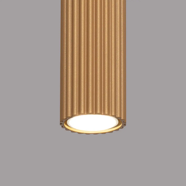 Plafonnier karbon or design minimaliste cylindrique avec texture cannelée verticale et base circulaire lumineuse