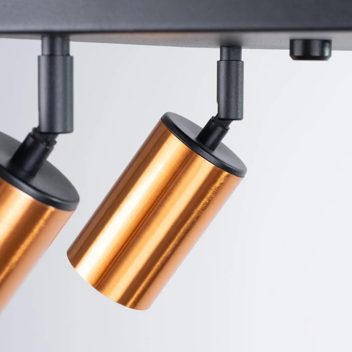 Luminaire plafonnier winx 4 avec lampe winx allie design cuivre et fixation noire en métal cylindrique