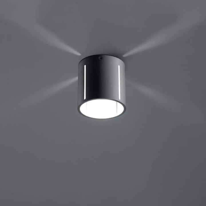 Plafonnier moderne gris cylindrical avec perforation linéaire blanche et spectacle lumineux circulaire éclatant