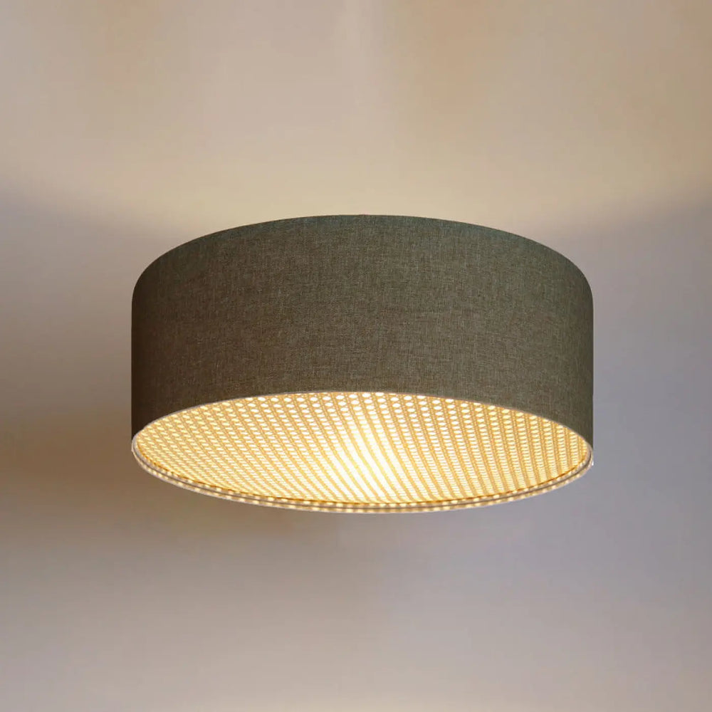 Luminaire plafonnier boho elegant gris vert with a dark gray textured fabric shade and warm golden led glow inside