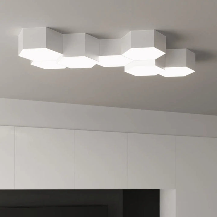 Luminaire plafonnier sunde 11 blanc avec formes géométriques modernes en hexagone et design épuré