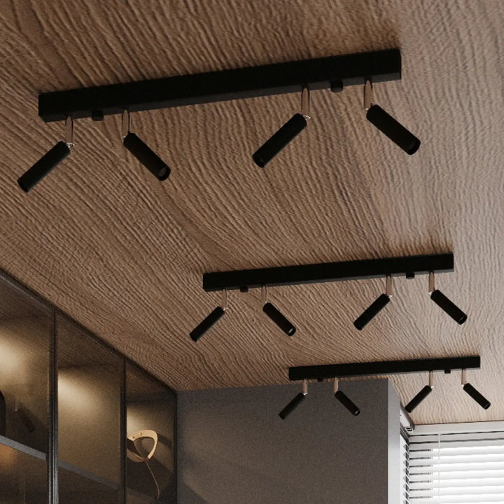 Luminaire plafonnier eyetech 3 noir avec spots orientables style industriel d’ambiance loft sur plafond texturé