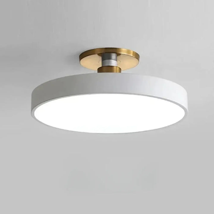 Modern ceiling light luminaire plafonnier bisco with white lumière blanche and brass-finished mounting base