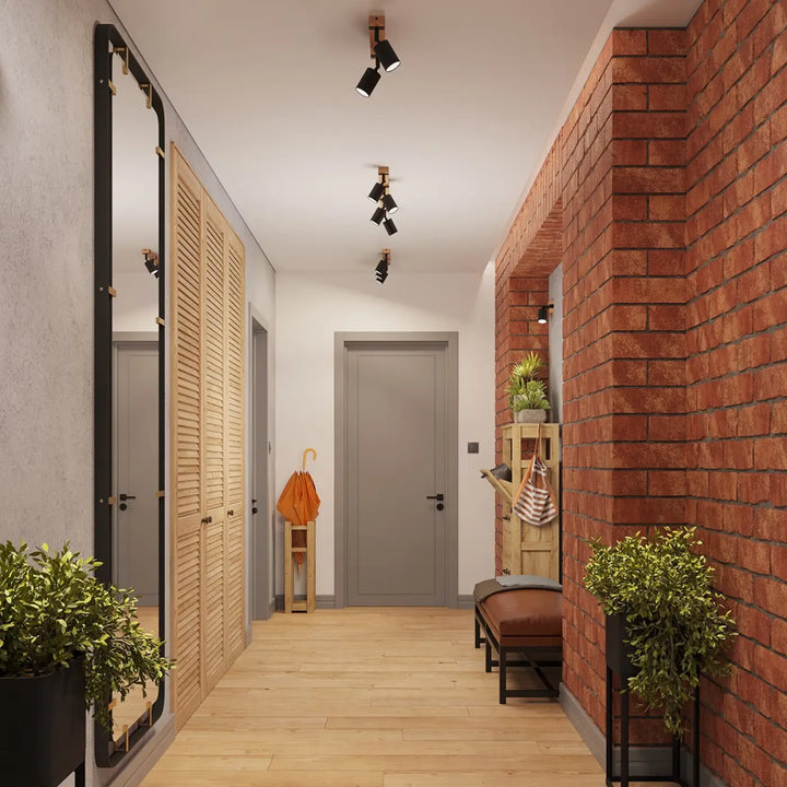 Le luminaire plafonnier fager 4l noir avec boîtier moderne illumine un couloir avec un miroir cadre noir