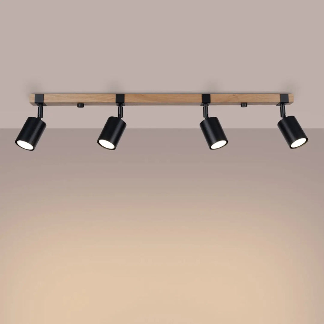 Luminaire plafonnier fager 4l noir avec lampe directionnelle fager et abat-jours orientables sur boîtier moderne en bois clair