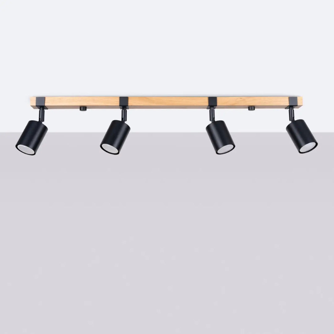 Luminaire plafonnier fager 4l noir avec lampe directionnelle fager et abat-jours orientables sur boîtier moderne en bois clair