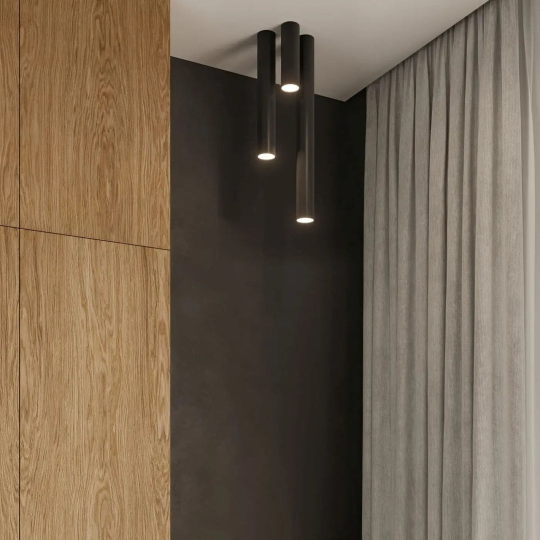 Luminaire plafonnier lagos 10 noir avec trois cylindres élégance moderne pour une lumière fonctionnelle chaleureuse