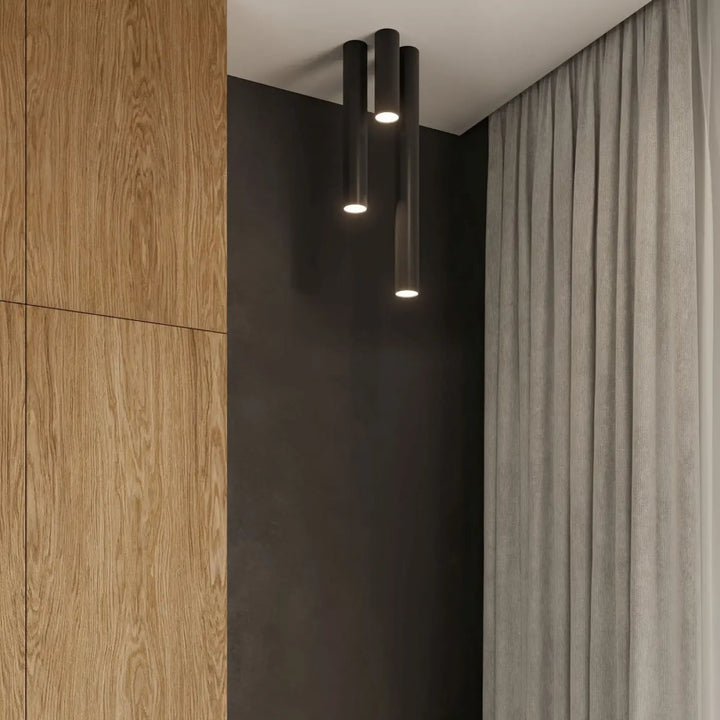 Luminaire plafonnier lagos 10 noir avec trois cylindres élégance moderne pour une lumière fonctionnelle chaleureuse