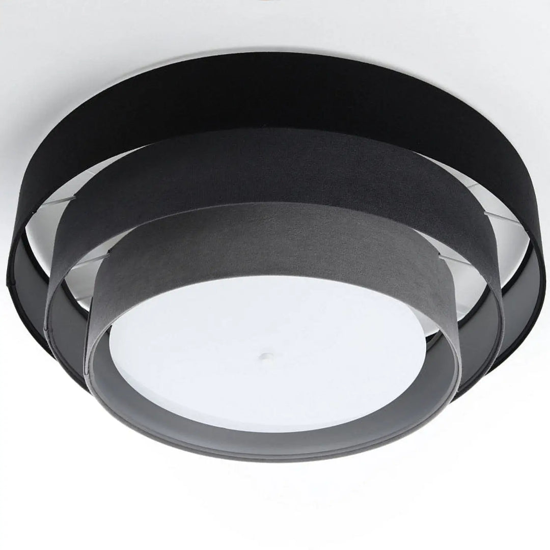 Luminaire plafonnier noir gris avec abat-jour en tissu superposé et diffuseur central blanc moderne