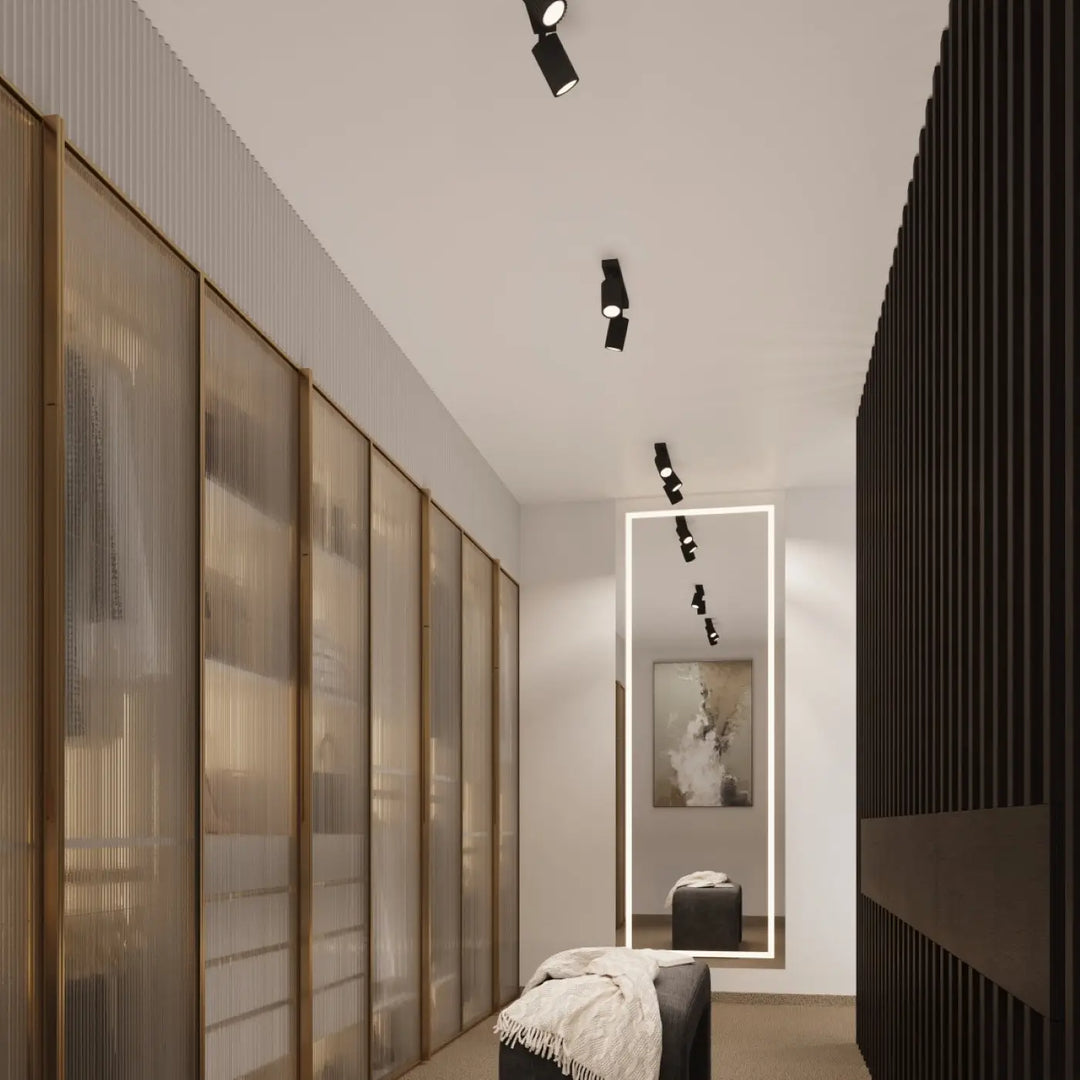 Luminaire plafonnier karbon 4 noir avec ampoules gu10 interchangeables et design minimaliste monté au plafond blanc