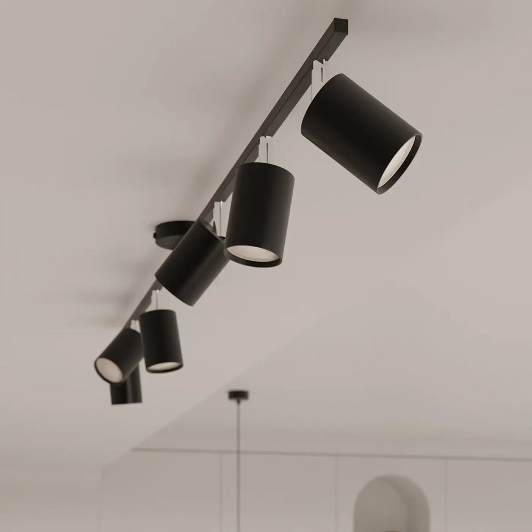 Luminaire plafonnier lemmi 4l noir avec lampes lemmi, forme minimaliste et têtes réglables sur rail moderne mat