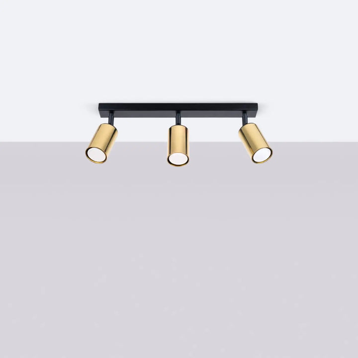 Plafonnier winx noir cooper avec trois spots cylindriques ajustables en finition or moderne pour éclairage intérieur