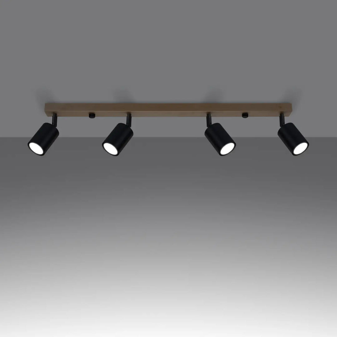 Luminaire plafonnier verdo 4 noir avec design moderne en spot cylindrique noir monté sur rail effet bois clair