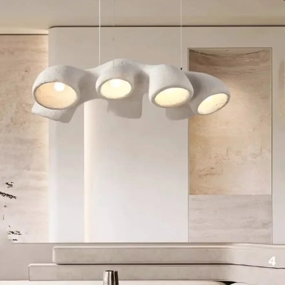 Suspension luminaire lucrecy en béton blanc moderne avec quatre abat-jours arrondis organiques