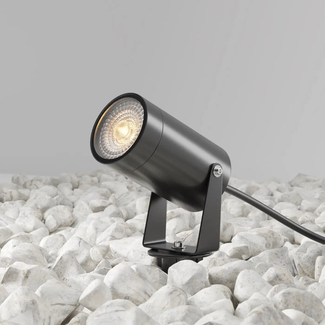 Luminaire extérieur piquet scope en acier noir avec spot cylindrique ajustable et lentille en verre dépoli