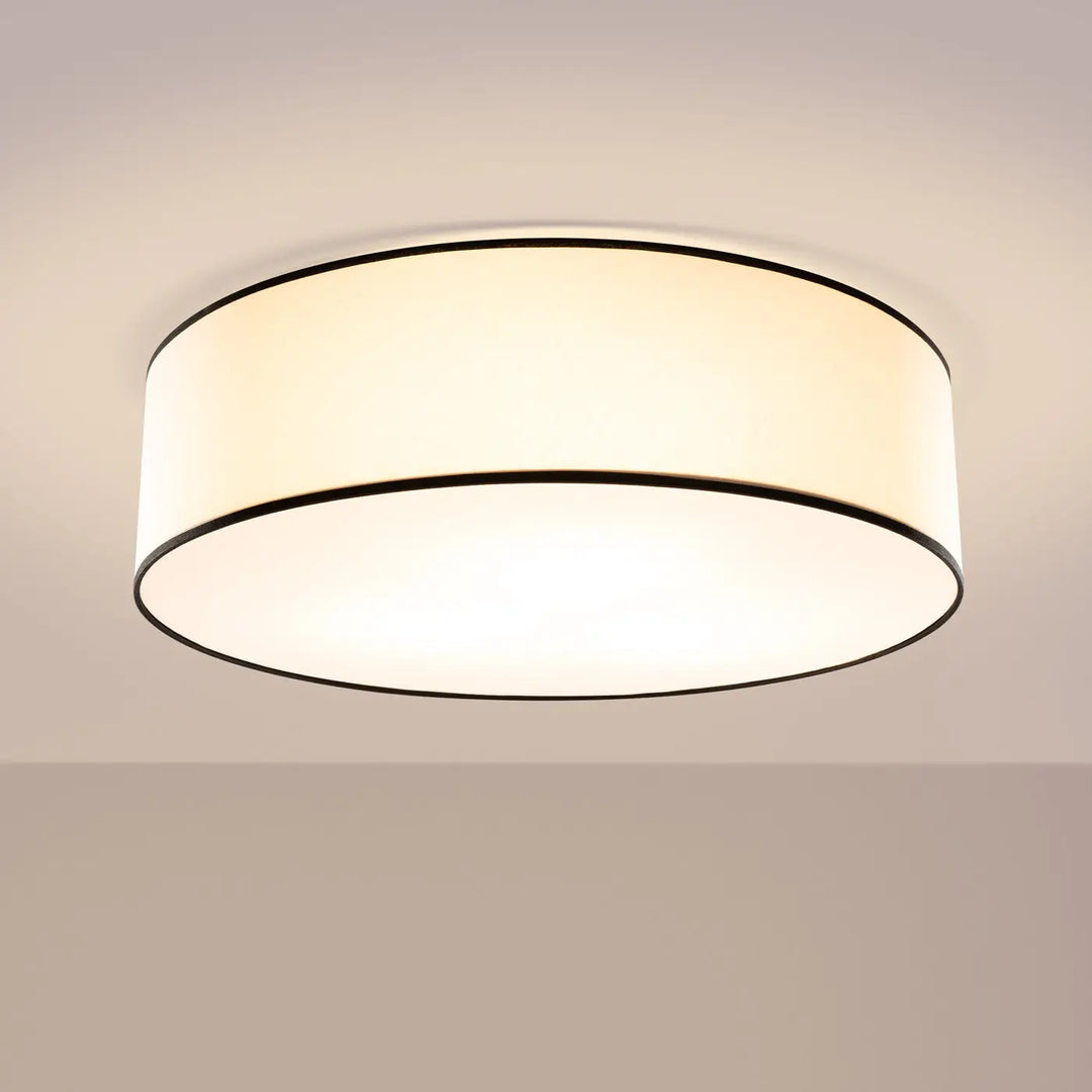 Plafonnier TOP blanc allumée, au plafond