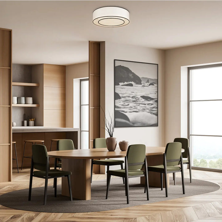 Plafonnier bergamo moderne avec abat-jour cylindrique blanc et anneau métallique fin pour salle à manger