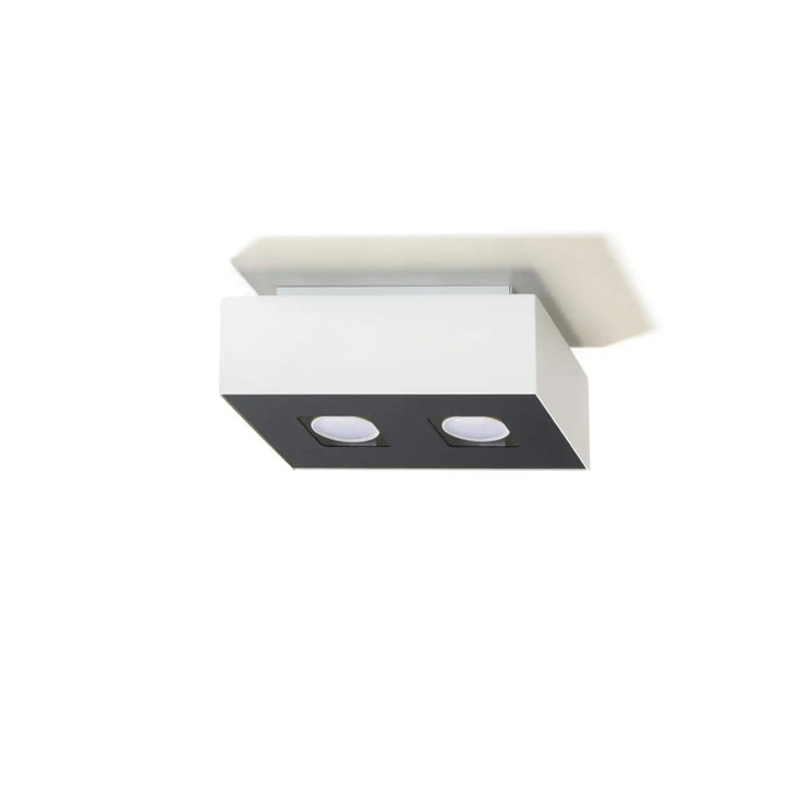 Luminaire plafonnier mono à spots alignés avec boîtier d’acier moderne blanc et noir vue face inférieure
