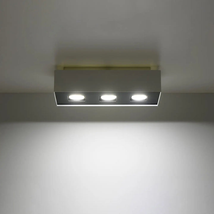 Luminaire Plafonnier blanc/noir allumée, vue rapprochée