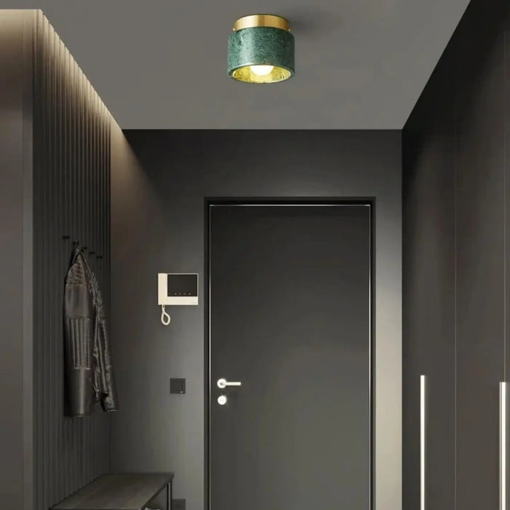 Plafonnier cylindre marbre élégant ambiance luxe blanc