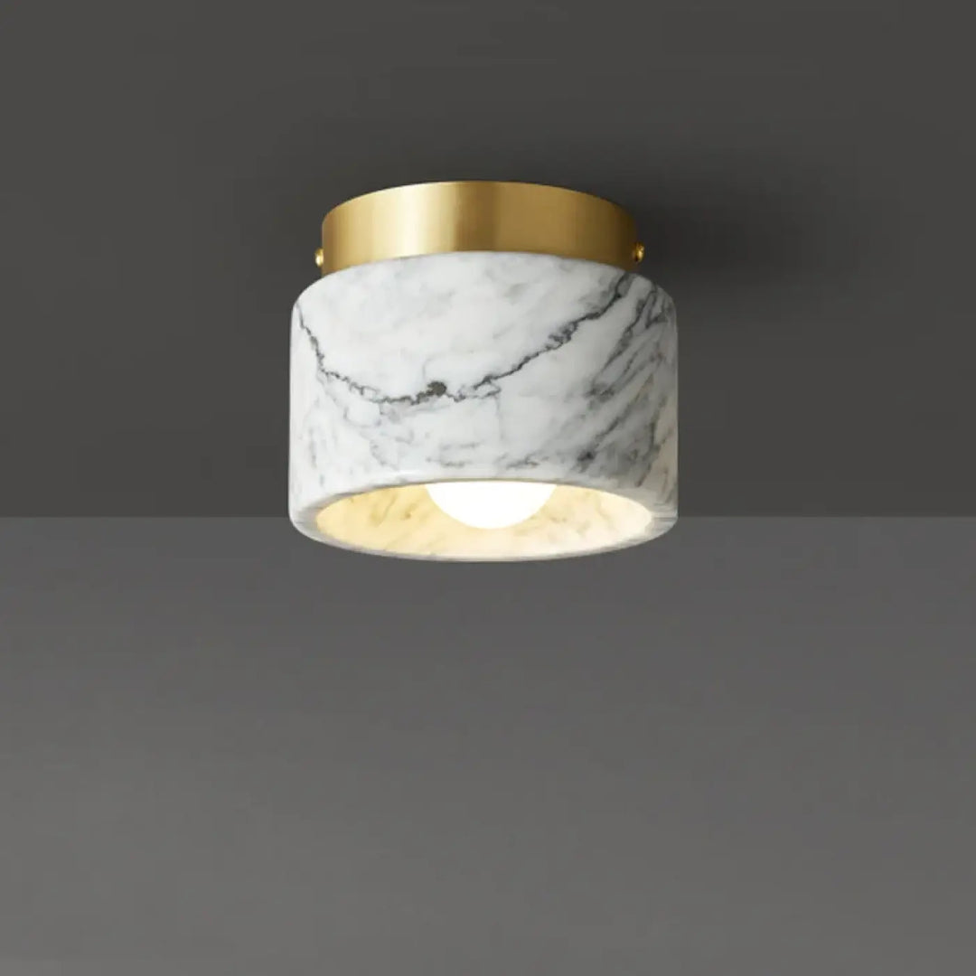 Plafonnier cylindre marbre élégant ambiance luxe blanc