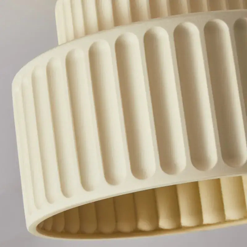 Plafonnier cylindrique strié au look rétro et original

