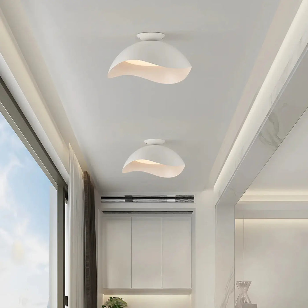 Plafonnier design blanc moderne forme sculptée lumineuse