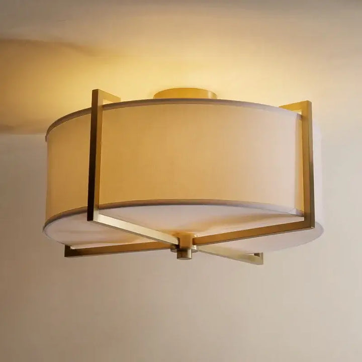 Plafonnier design moderne en métal doré avec abat jour blanc

