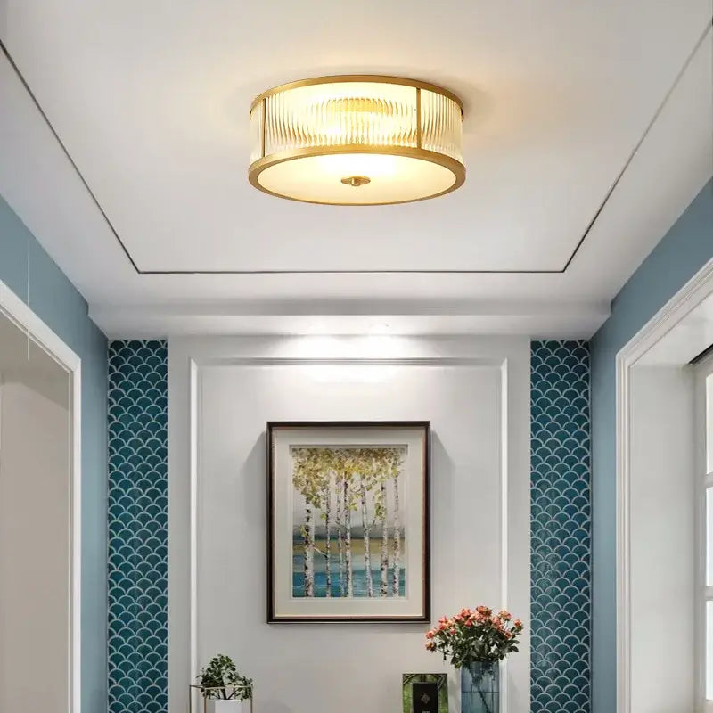 Plafonnier design moderne en verre strié doré