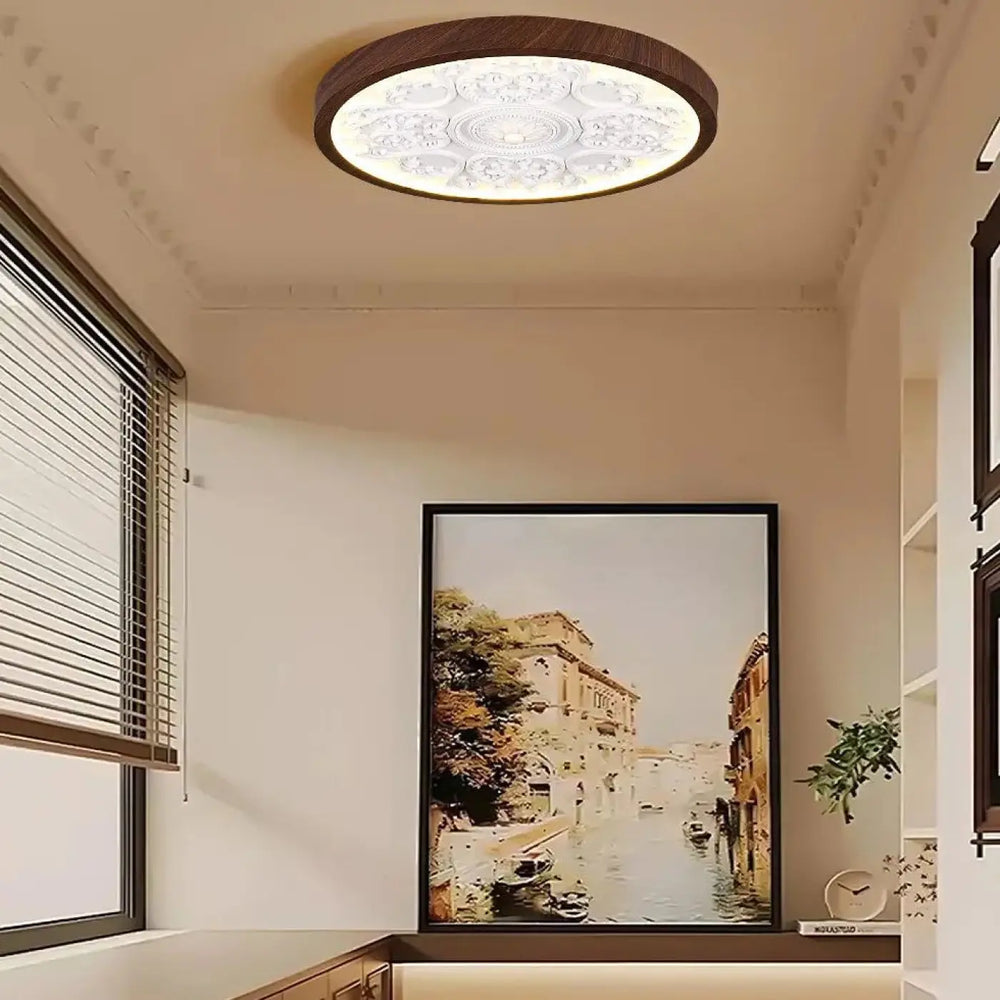 Luminaire plafonnier rostel avec design rond à cadre en bois foncé et centre blanc lumineux à motif blanc complexe