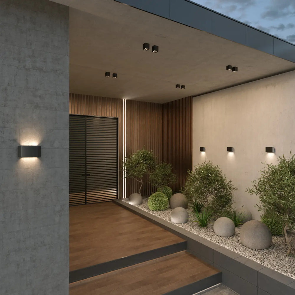 Luminaire extérieur ares avec plafonnier extérieur métal graphite en métal graphite long d’une galerie design minimaliste noir
