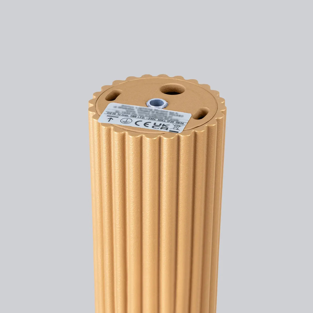 Base de lampe cylindrique en or ribbée avec surface texturée et trous de montage pour plafonnier karbon allie