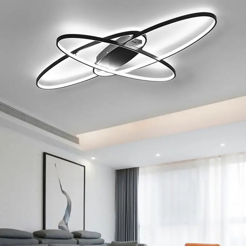 Plafonnier LED anneaux entrelacés style moderne futuriste

