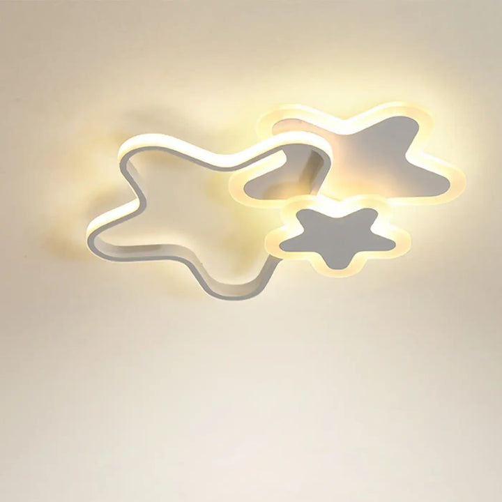 Luminaire plafonnier kidora led contemporain aux formes étoiles en métal argenté avec lumière d ambiance chaude