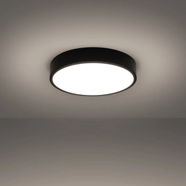 Luminaire plafonnier noir allumé