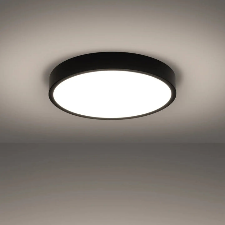 Luminaire plafonnier noir allumé