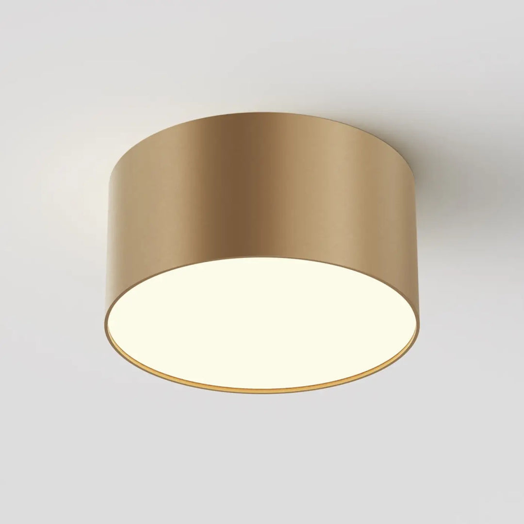 Luminaire plafonnier led zon rond minimaliste en finition or mat avec éclairage blanc doux et profil fin cylindrique
