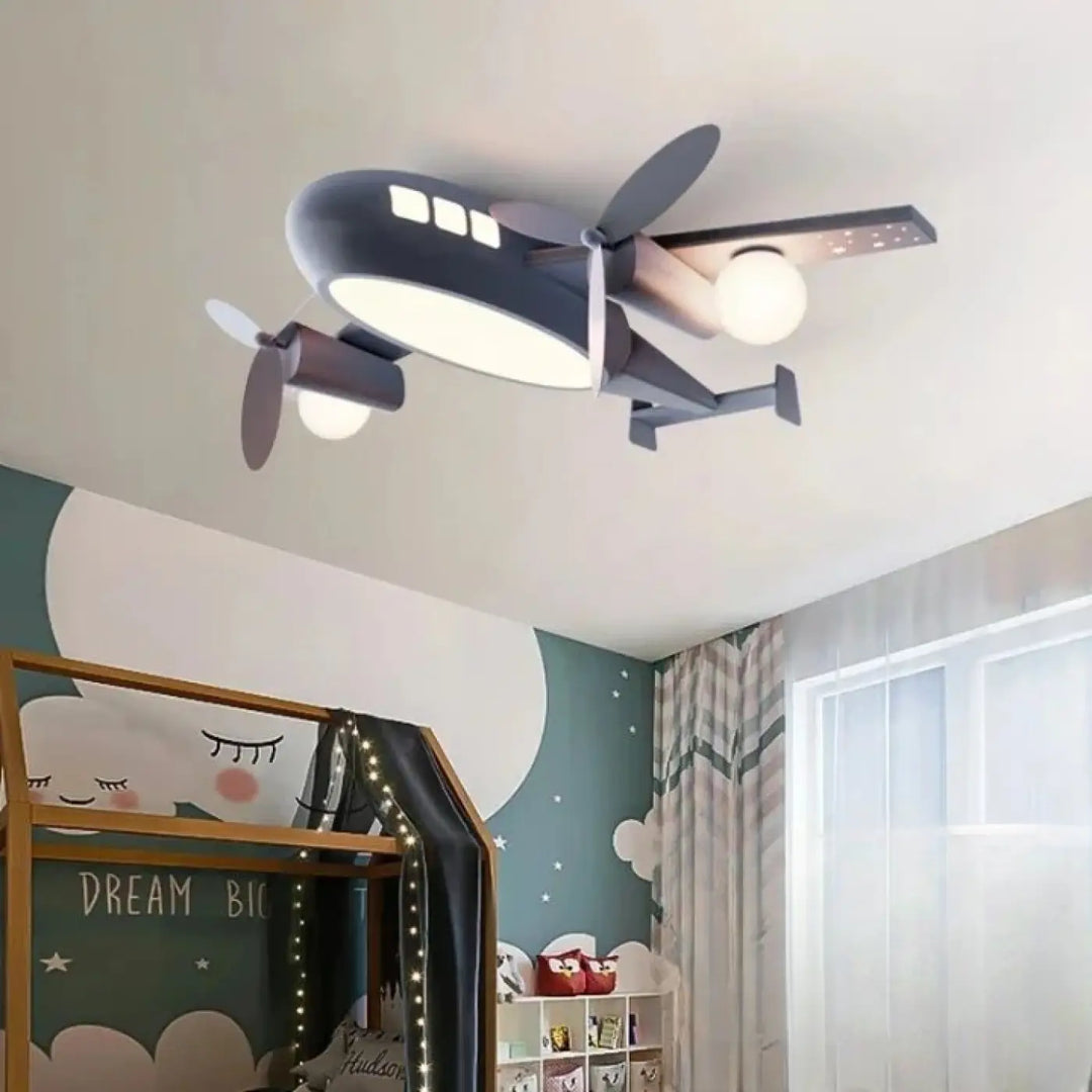 Luminaire plafonnier aeris en forme d’avion gris foncé avec ailes et hélices illuminées en lumière blanche pour chambre à coucher