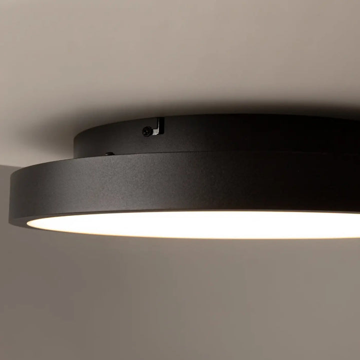 Plafonnier orign effet pierre noir avec lumière chaude douce et design moderne pour un éclairage élégant