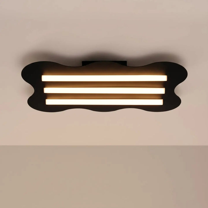 Plafonnier KLOVER noir allumée, au plafond