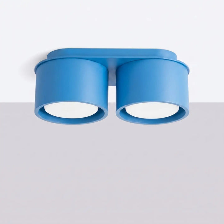 Plafonnier rond plat bleu clair éteint, vue rapprochée