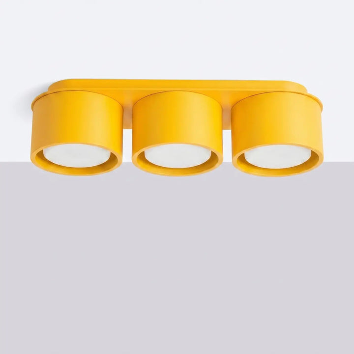 Plafonnier rond plat jaune éteint, vue rapprochée
