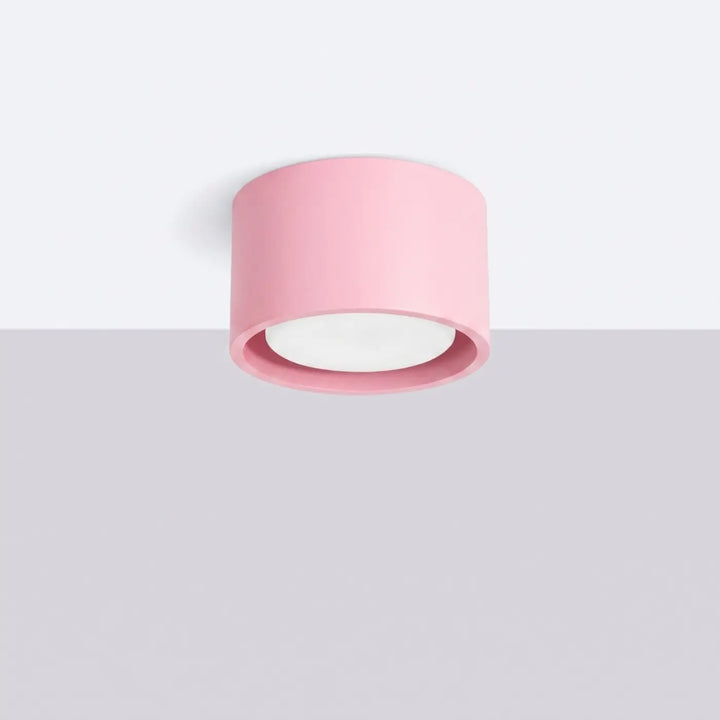 Plafonnier rond plat rose éteint, vue rapprochée