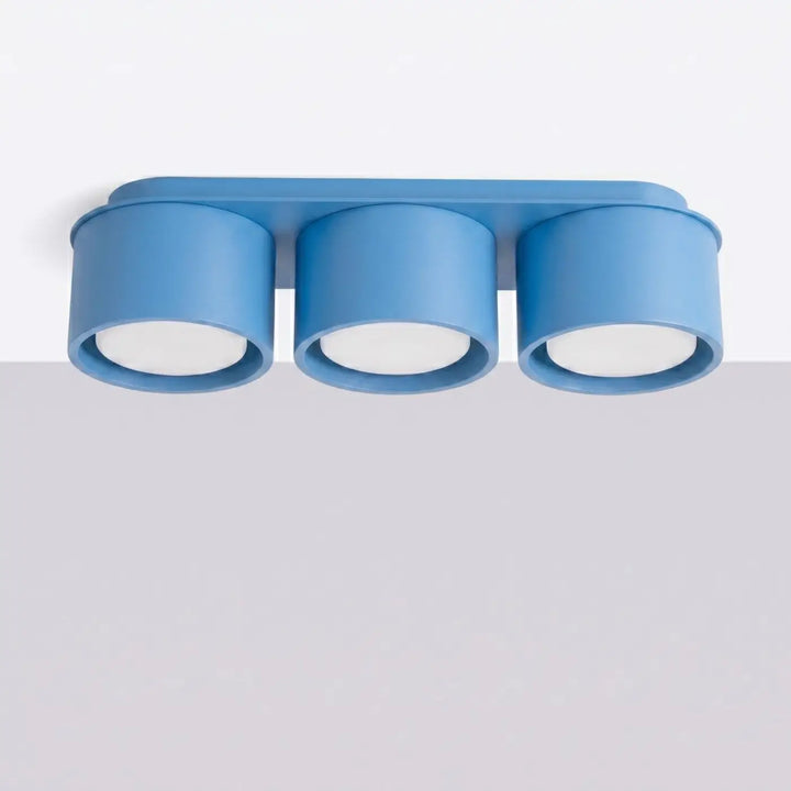 Plafonnier rond plat bleu clair éteint, vue rapprochée