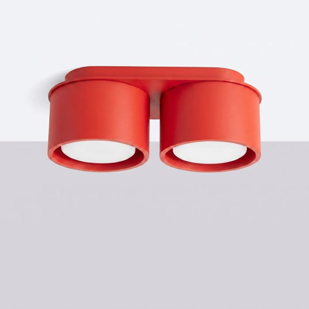 Plafonnier rond plat rouge éteint, vue rapprochée