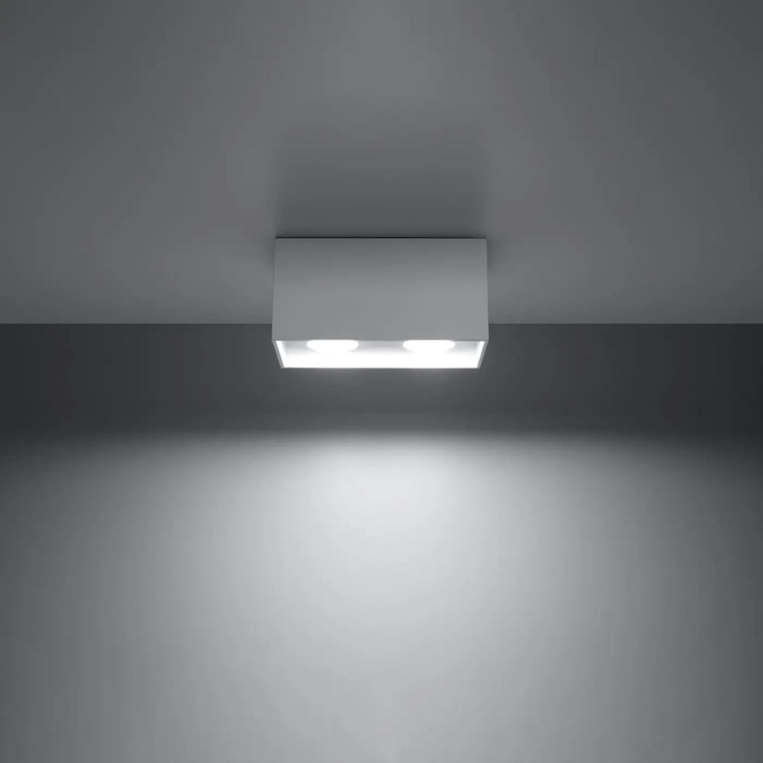 Luminaire Plafonnier blanc allumée, vue rapprochée
